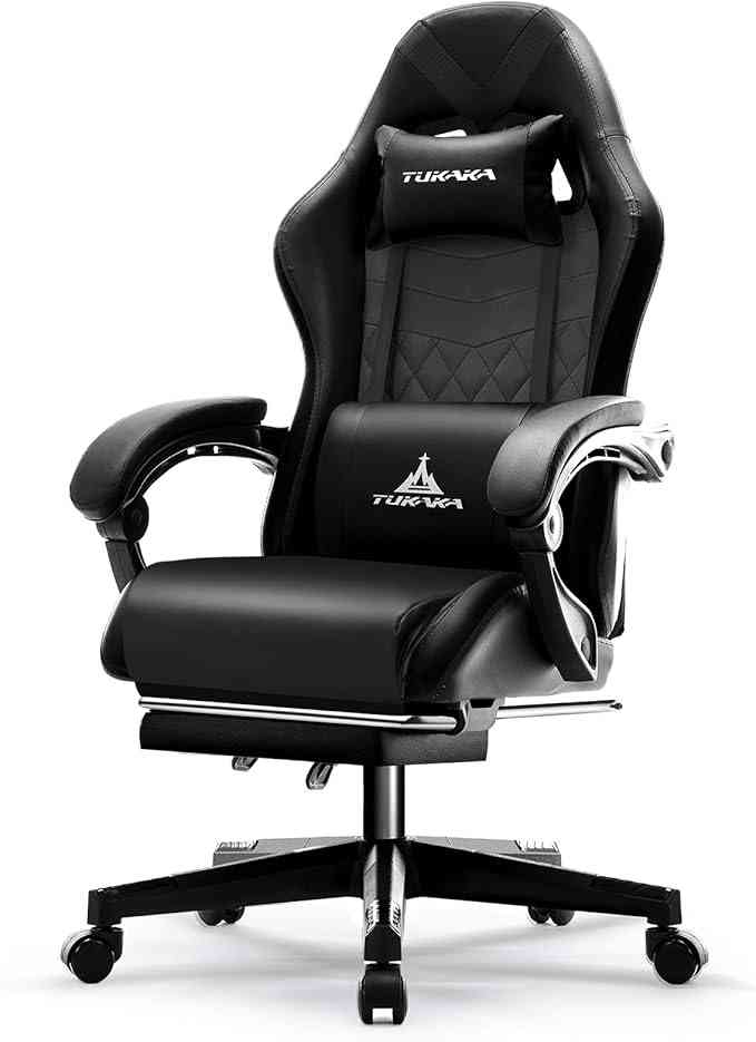 Black ergonomic gaming chair with massage feature, adjustable footrest, and quilted leather upholstery