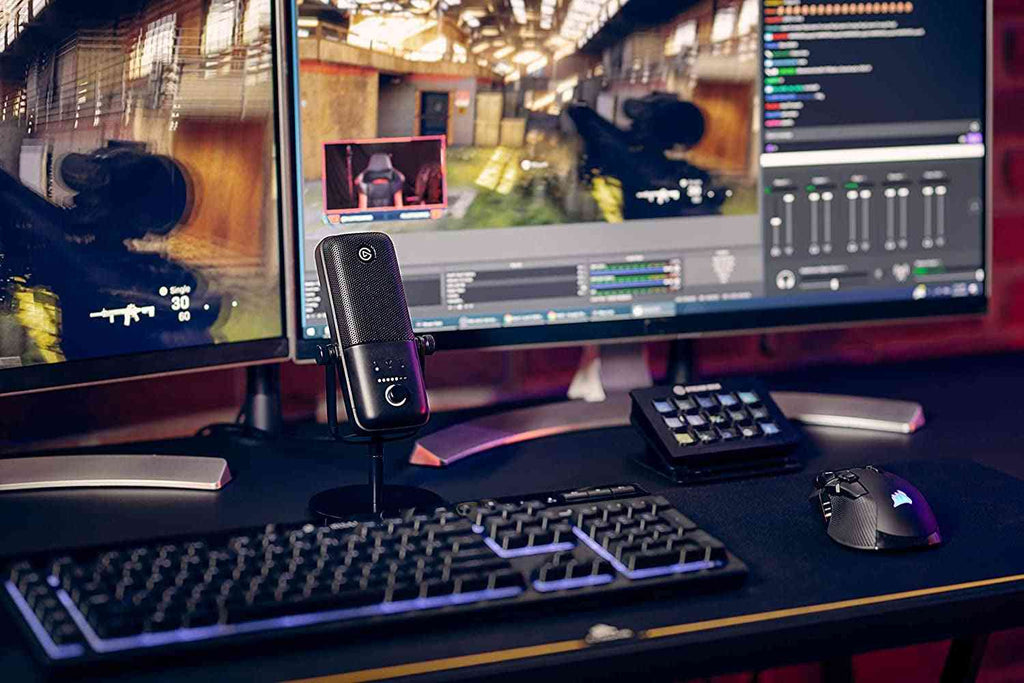 gaming setup with USB microphone and monitors